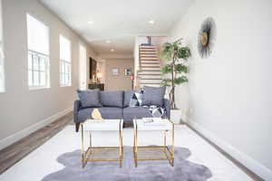 Living room featuring hardwood / wood-style flooring