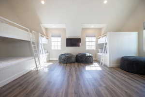 Unfurnished bedroom featuring hardwood / wood-style floors