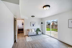 Sitting room featuring light hardwood / wood-style flooring