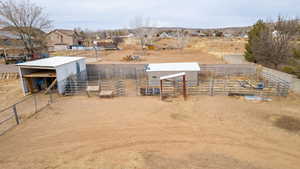 Exterior space featuring an outbuilding and a rural view