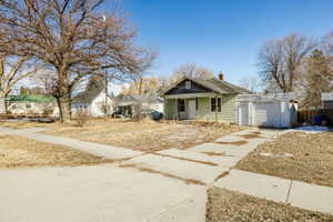 View of front of property with a garage