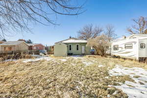 View of snow covered property