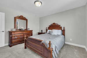 View of carpeted bedroom