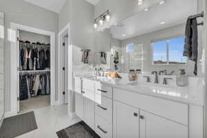 Bathroom with a shower and vanity