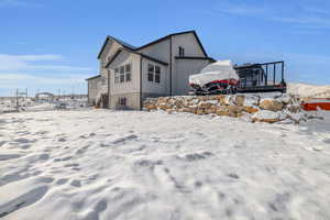 View of snow covered property