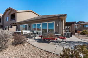 Back of property featuring an outdoor hangout area, a pergola, central AC, and a patio