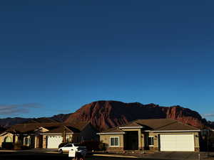 View of front of house featuring a mountain view