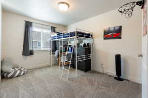 Bedroom featuring carpet