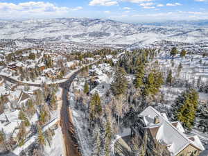 Snowy aerial view with a mountain view