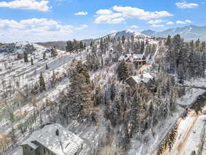 Snowy aerial view with a mountain view