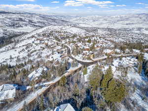 Snowy aerial view with a mountain view