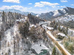 Snowy aerial view with a mountain view