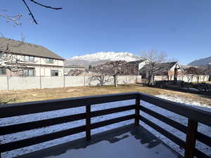 Yard with new deck and a mountain view