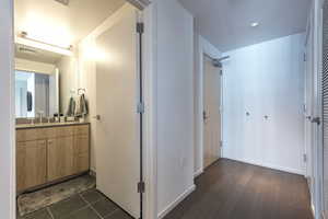 Bathroom with tile patterned flooring and vanity