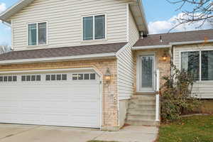 View of front of house with a garage