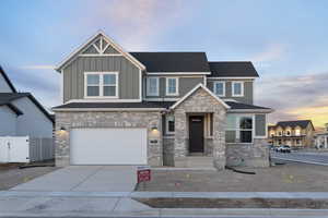 View of front of property with a garage