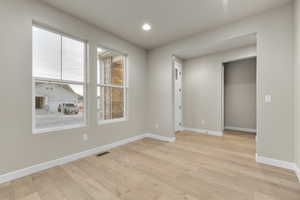 Unfurnished room featuring light hardwood / wood-style floors