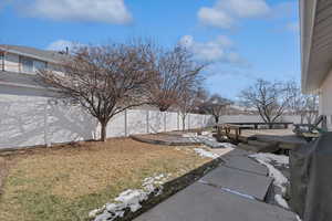 View of yard with a wooden deck