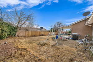 View of yard featuring a playground