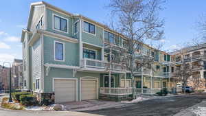 View of property with a garage