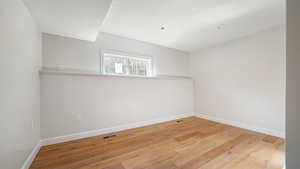 Empty room featuring light hardwood / wood-style floors