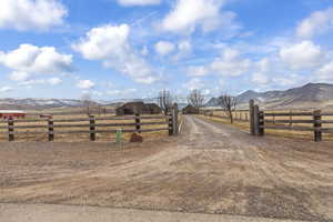 View of street featuring a mountain view and a rural view