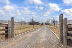 View of street with a mountain view and a rural view