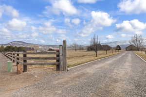 View of road featuring a rural view and a mountain view