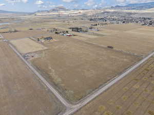 Drone / aerial view featuring a mountain view and a rural view