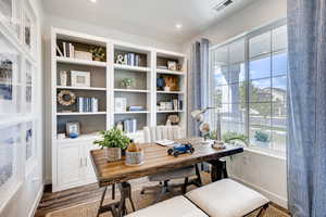 Home office featuring wood-type flooring