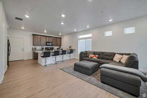 Living room featuring light wood-type flooring