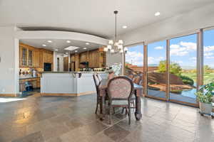 Dining area featuring an inviting chandelier