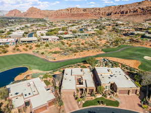 Aerial view featuring a water and mountain view