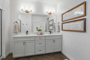 Bathroom with vanity and walk in shower