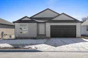 Ranch-style home with a garage