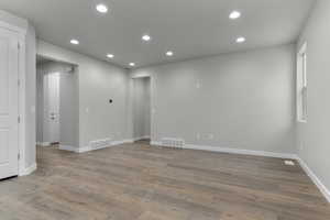 Empty room featuring light hardwood / wood-style floors