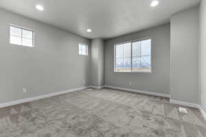 View of carpeted spare room