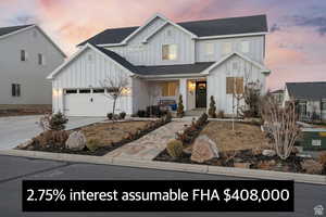 Modern inspired farmhouse with a garage