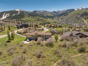 View of mountain backdrop with nearby suburban area