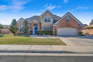 View of front of home featuring a front lawn