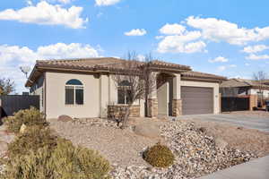 View of front of property with a garage