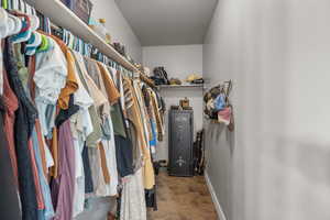 Spacious closet featuring tile patterned flooring