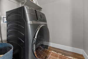 Clothes washing area with washer and clothes dryer