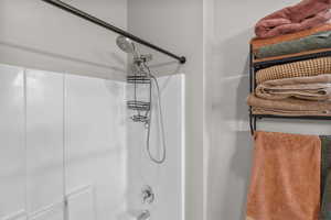 Bathroom featuring shower / bathtub combination