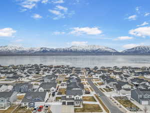 Aerial view featuring a water and mountain view