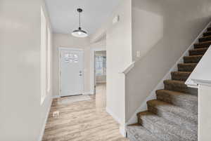 Foyer featuring light hardwood / wood-style flooring