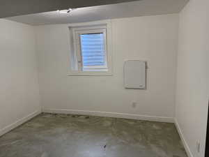 Spare room with a textured ceiling