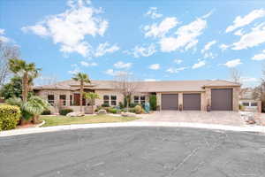 View of front of property with a garage