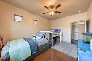 Bedroom featuring ceiling fan