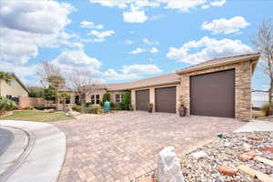 View of front facade featuring a garage